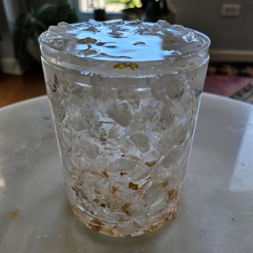 Clear quartz crystal with gold leaf
